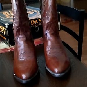 Dan post boots brand new brown was 399 dollars new